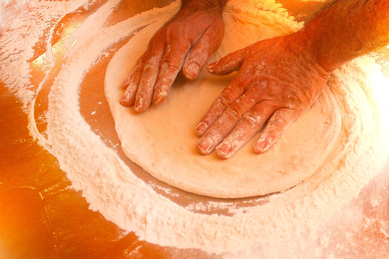 kneading dough rustic kitchen